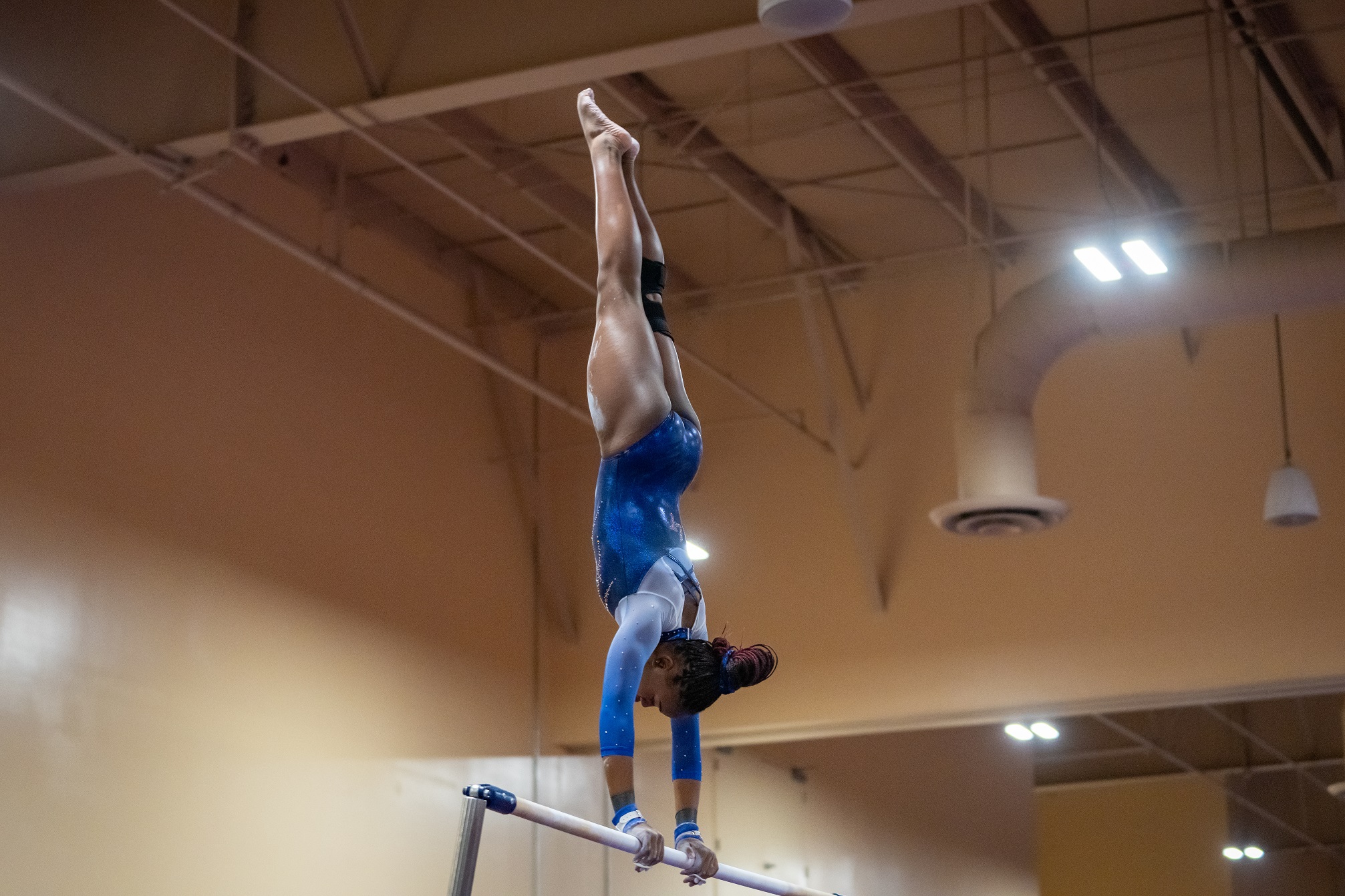 Rachel-Shines-gymnast-Stroud-Family-Colorado-lands-uneven-bars-giants